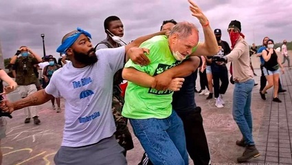 At a prayer vigil in Saint Louis, Missouri, members of a Marxist group, Black Lives Matter, viciously attack the people who are praying.